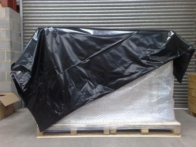 The pallet is then covered in our shrink-wrap film and heat treated for a tight fit.